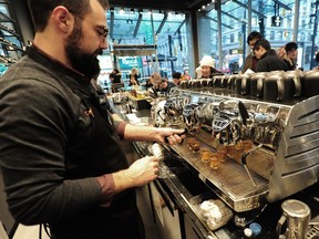 FILE PHOTO: Opening day action as Starbucks reveals its latest and largest store, the new Starbucks Reserve Bar in Vancouver, BC., December 11, 2018.