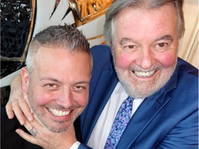 Phil Heard put a mock stranglehold on son and Heard Productions business partner Jason to open the New Car Dealers Association of B.C.'s Vancouver International Auto Show of which Jason is executive director.