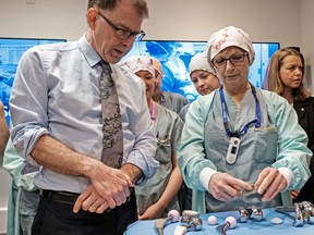 Health Minister Adrian Dix tours a hip and knee program replacement program on Vancouver Island last year.