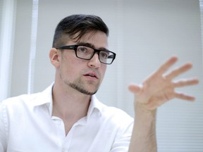 A file picture taken on May 23, 2014 shows the local leader of the Identitarian Movement (IBOe) far right group, Martin Sellner during a press conference in Vienna, Austria.