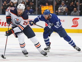 Leon Draisaitl of the Edmonton Oilers, left, is the hottest player in the NHL, almost a goal-a-game the last five weeks with 17 goals in his past 18 games. He will look to keep that streak going when he faces the visiting Vancouver Canucks Thursday night.