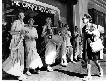 Hare Krishna devotees chant and play drums on Granville Street. August 16, 1978. Mark van Manen/Vancouver Sun [PNG Merlin Archive]