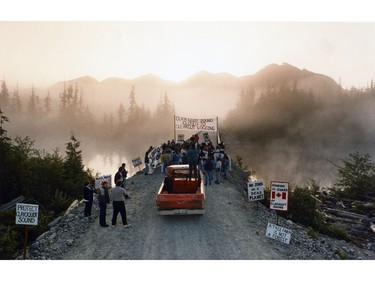 Clayoquot Sound logging protesters gathered at daybreak on July 7, 1993 at the Kennedy River Bridge in preparation for another day of confrontations with loggers and RCMP enforcing a Supreme Court injunction.