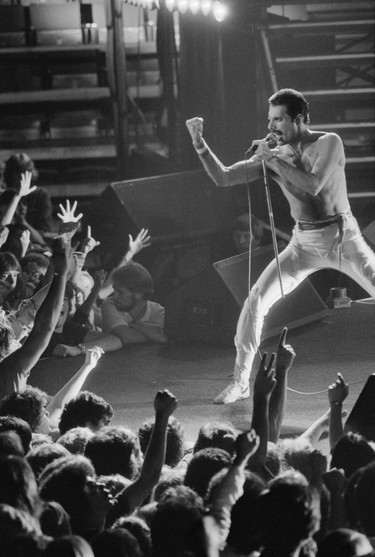 September 4 1982.  Freddie Mercury of Queen onstage at Vancouver's Pacific Coliseum.  Mark van Manen / Vancouver Sun. #82-2561  [PNG Merlin Archive]