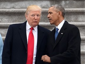 U.S. President Donald Trump and former president Barack Obama talk on the East front steps of the U.S. Capitol after inauguration ceremonies for Trump on Jan. 20, 2017 in Washington, D.C.