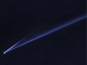 This undated photo captured by the Hubble Space Telescope and made available by NASA on March 28, 2019 shows the asteroid (6478) Gault that is gradually self-destructing. It is spinning so fast, dusty material ejected from the surface has has formed two long, thin, comet-like tails. The longer tail stretches more than 500,000 miles (800,000 kilometres) and is roughly 3,000 miles (4,800 kilometres) wide.
