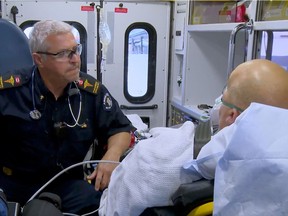 A Vancouver paramedic specialist with advanced training tends to a heart failure patient, en route to St. Paul's Hospital. The scene is in the last episode of a new documentary series on Knowledge Network, Paramedics: Life on the Line. It premieres April 2.
