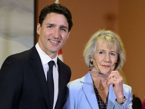 Prime Minister Justin Trudeau stands with Joyce Murray after she was sworn in as Treasury Board president in a federal cabinet shuffle at Rideau Hall in Ottawa on Monday, March 18, 2019.
