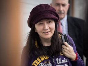 Huawei chief financial officer Meng Wanzhou, who is out on bail and remains under partial house arrest after she was detained Dec. 1 at the behest of American authorities, arrives back at her home after a court appearance in Vancouver, on Wednesday March 6, 2019.