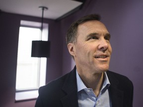 Federal Finance Minister Bill Morneau arrives for a pre-budget photo opportunity in Toronto on Thursday, March 14, 2019. Morneau visited the Toronto and Kiwanis Boys and Girls Club for the media event.