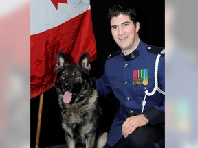 Abbotsford Police Department's Cpl Aaron Courtney, one of the police officers struck and injured by a vehicle while training in Burnaby Monday, has been released from hospital. His dog, Koda, was uninjured.
