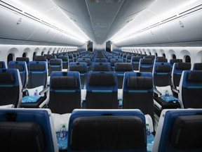 Economy class seating in the new WestJet 787 Dreamliner airplane is shown in Calgary on February 14, 2019. In the wake of an onboard incident where flight attendants and bystanders acted swiftly to deal with alleged sexual harassment, Canada's two biggest airlines say its crews are trained to handle passengers who pose a threat -- though one expert warns that airline policy and behaviour are two different matters.