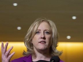 Lisa Raitt, Deputy Leader of the Conservative Party talks to reporters during a break of the Conservative caucus on Parliament Hill in Ottawa on Friday, January 25, 2019. The Conservatives are asking the federal judicial affairs commissioner to investigate the leak of confidential information about former justice minister Jody Wilson-Raybould's controversial choice for chief justice of the Supreme Court of Canada.
