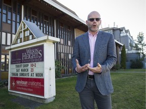 Metro Vancouver grows by 40,000 people each year, plus there is ongoing housing demand from 140,000 international students and temporary workers. Churches are helping increase supply, at least somewhat. (Photo: Simon Davie outside Wilson Heights Church in Vancouver, which created housing on its parking lot, right.)