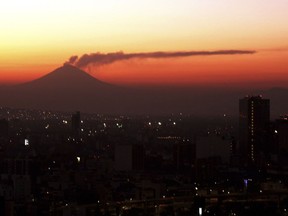 A plume of ash and steam emanates from the Popocatepetl volcano at sunrise, seen from Mexico City, Sunday, March 3, 2019. The volcano known as "Don Goyo" has been active since 1994.
