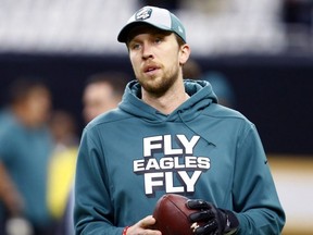 In this Jan. 13, 2019, file photo, Eagles quarterback Nick Foles warms up before an NFL divisional playoff game against the Saints in New Orleans.