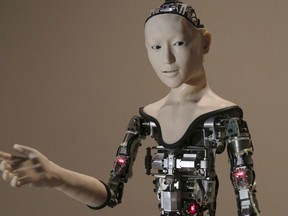 FILE - This Monday, Aug. 1, 2016 file photo shows the humanoid robot "Alter" on display at the National Museum of Emerging Science and Innovation in Tokyo. Understanding humor may be one of the last things that separates humans from ever smarter machines, computer scientists and linguists say.