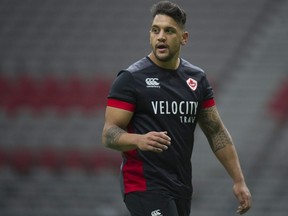 Team Canada's Mike Fuailefau gets a breather in during practice at B.C. Place Stadium on Wednesday, March 6, 2019.