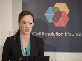 Shannon Salter, chair of the Civil Resolution Tribunal, unveils plans to address motor vehicle injury claims during a news conference in Vancouver on Friday.