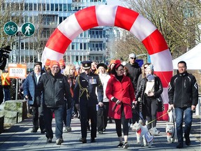 More than 500 people turned out Sunday for the Walk in Her Shoes March at the Creekside Community Centre.