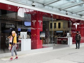 The Tesla dealership on West Fourth in Vancouver. Tesla's three Vancouver sales outlets are at risk of closing after the electric-car maker revealed it was shifting to online sales only.
