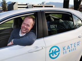 Kater CEO Scott Larson shows off one of the ride-hailing company's new vehicles. The app beta launches on March 30.
