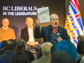 MLA Mike de Jong talks to farmers in Surrey. MLAs held a news conference to protest plans to change laws around the Agricultural Land Reserve that would ban farmers from applying to have their farms or part of their farms removed from the ALR.