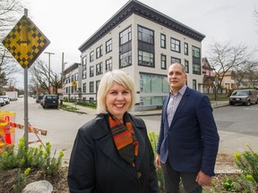 Adriane Carr and Pete Fry at the corner of Keefer and Heatley streets in Vancouver on March 25. Carr sparked a recent motion that blasted the city for 'incentivizing and subsidizing rental housing only affordable for households at higher incomes.'