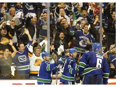 Vancouver Canucks Fans go wild as they cheers for Mikael Samuelsson, 26, after he scored the opening goal of the playoff for the Canucks,  against the Los Angeles Kings  in game 1 of the Stanley Cup playoffs at G.M. Place. in Vancouver B.C. on April 15, 2010.