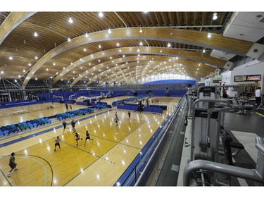 Richmond B.C.  FULL OF LIFE-- Activities abound in the redesigned Richmond Oval - the former home of Speed skating track during the 2010 Olympic Winter games.  The large facility is now home to two ice rinks, basketball courts, a running track and workout area above in Richmond on January 9, 2014.  Mark van Manen/PNG Staff   see  Roger W. Vancouver Sun News  /& Web Stories    [PNG Merlin Archive]