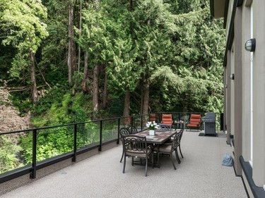 A view of a deck of a house at 39623 Old Yale Road in Abbotsford, B.C. is shown in a handout photo. Bidding opens Tuesday on the 12-bedroom, 10-bath restored train power station listed as the "Sumas Powerhouse," which previously sold for $5 million.