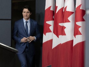 Prime Minister Justin Trudeau arrives to deliver remarks at the National Press Theatre in Ottawa on Thursday, March 7, 2019.