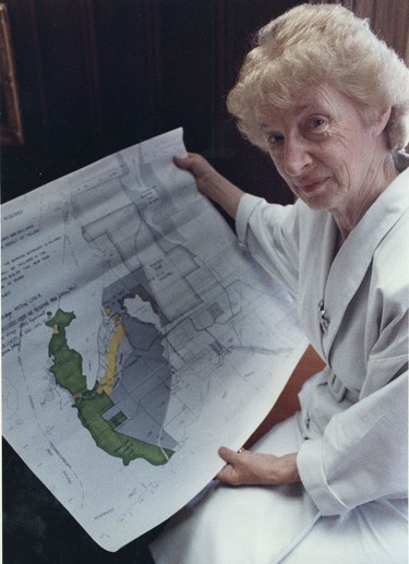 Photo of Alderman May Brown with a map of Sasamat Lake on Aug. 2, 1986.