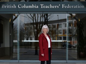 Teri Mooring poses in this Feb. 2 handout photo outside the BCTF headquarters in Vancouver.
