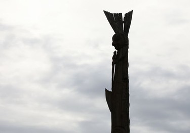 Part of a totem pole is seen at the 'Ksan historical village near Hazelton in northwestern British Columbia on Sunday, Sept. 2, 2018.