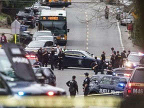 Looking north up Sand Point Way Northeast towards Northeast 123rd Street near the scene of a shooting in Seattle, Wednesday, March 27, 2019.