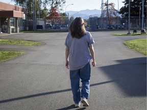 An inmate walks on the grounds of the Fraser Valley Institution for Women in an undated photo. It recently introduced a prisoner needle-exchange program.