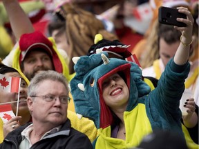 A  female sports fan, who really got into the World Rugby Seven Series last year, takes a selfie inside B.C. Place Stadium