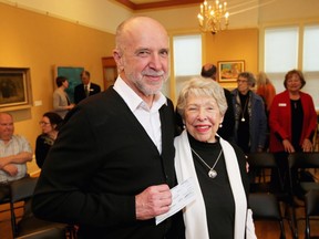 Jon Tupper, director of the Art Gallery of Greater Victoria, holds the cheque presented by Lyn Goldman, sister of the late Anthony Thorn, at a reception on Wednesday, April 10, 2019.