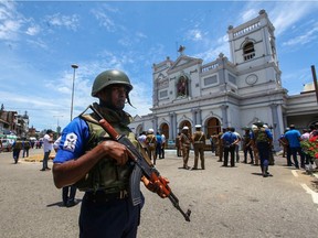 Sri Lankan security forces secure the area around St. Anthony's Shrine after an explosion hit St Anthony's Church in Kochchikade on April 21, 2019 in Colombo, Sri Lanka.