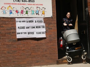 A sign warns people of measles in the ultra-Orthodox Jewish community in Williamsburg on April 10, 2019 in New York City.