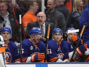 Head coach Barry Trotz of the New York Islanders handles bench duties against the Pittsburgh Penguins in Game 1 of their Eastern Conference first round playoff series at the Nassau Coliseum on April 10, 2019 in Uniondale, N.Y.