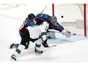 San Jose Sharks sniper Logan Couture scores his first of three goals on the night in a 4-2 victory over the Colorado Avalanche last night at Pepsi Center in Denver.