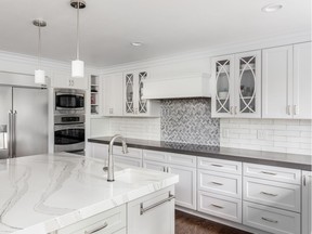 Kitchen cabinets refaced at about half the cost of replacing the entire structures.