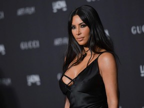 In this file photo taken on November 3, 2018, Kim Kardashian-West arrives for the 2018 LACMA Art+Film Gala at the Los Angeles County Museum of Art in Los Angeles, California.