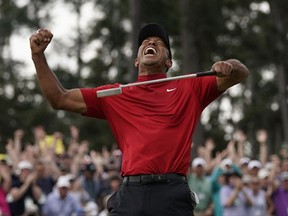 Tiger Woods celebrates as he wins the Masters golf tournament Sunday, April 14 in Augusta, Ga. His victory marked one of the sport's greatest comebacks.