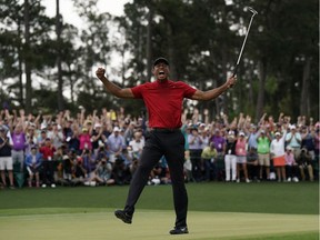 Tiger Woods reacts as he wins the Masters golf tournament on Sunday, April 14, 2019, in Augusta, Ga.