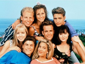 Luke Perry, Jason Priestley, Shannen Doherty, Jennie Garth, Tori Spelling, Brian Austin Green, Ian Ziering, and Gabrielle Carteris in Beverly Hills, 90210. Paramount Television