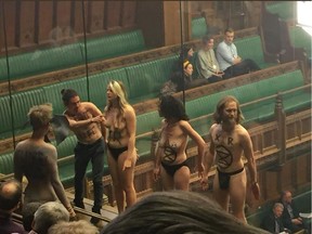 Climate-change protesters in the British House of Commons on April 1, 2019.