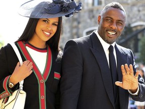 Idris Elba and Sabrina Dhowre arrive for the wedding ceremony of Prince Harry and Meghan Markle at St. George's Chapel in Windsor Castle in Windsor, near London, England, Saturday, May 19, 2018.